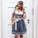 Uncovering the Tradition Behind the Colorful Dirndl Dress